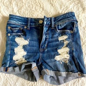 American Eagle denim shorts with rips, size 4 but could fit a 2-4.